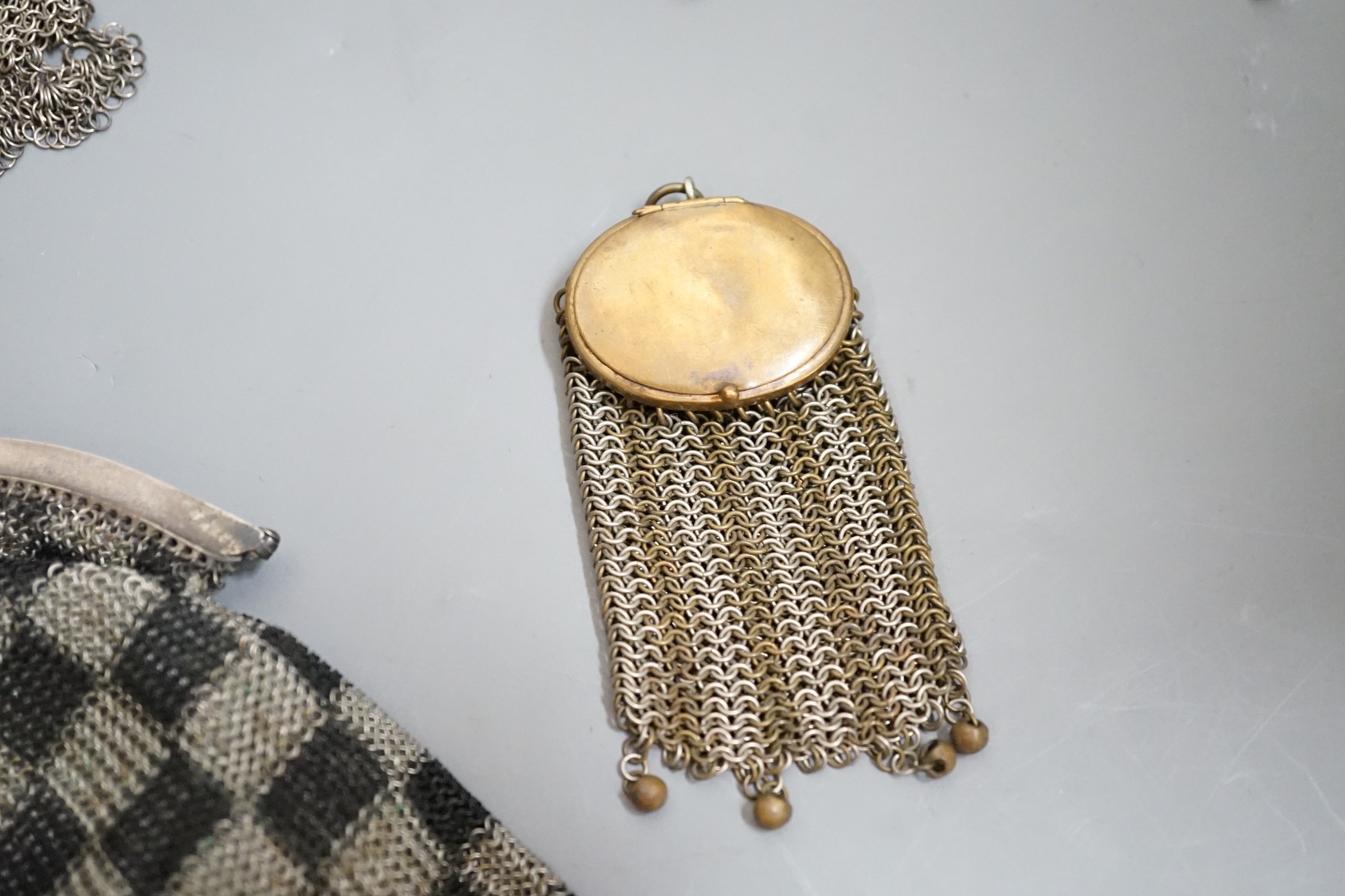 A collection of 19th century multi coloured metal chain mail evening bags and purses (14)